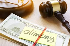 Image of justice and money.  Alimony and money issues in divorce.